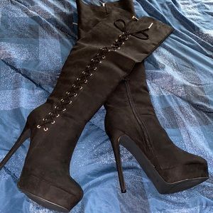 Thigh high boots with heel. Never worn